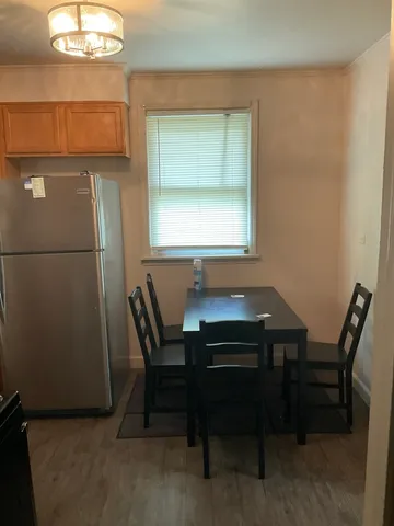 a view of a workspace with furniture