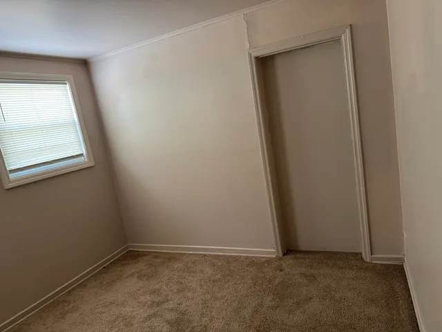 an empty room with window