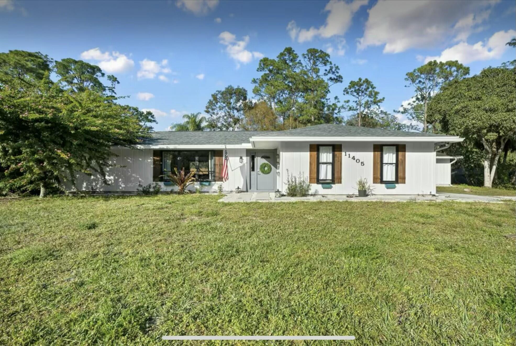 11405 175th Road North Jupiter Farms, FL 33478 - Photo 1 of 36 tempImageZj8pOB