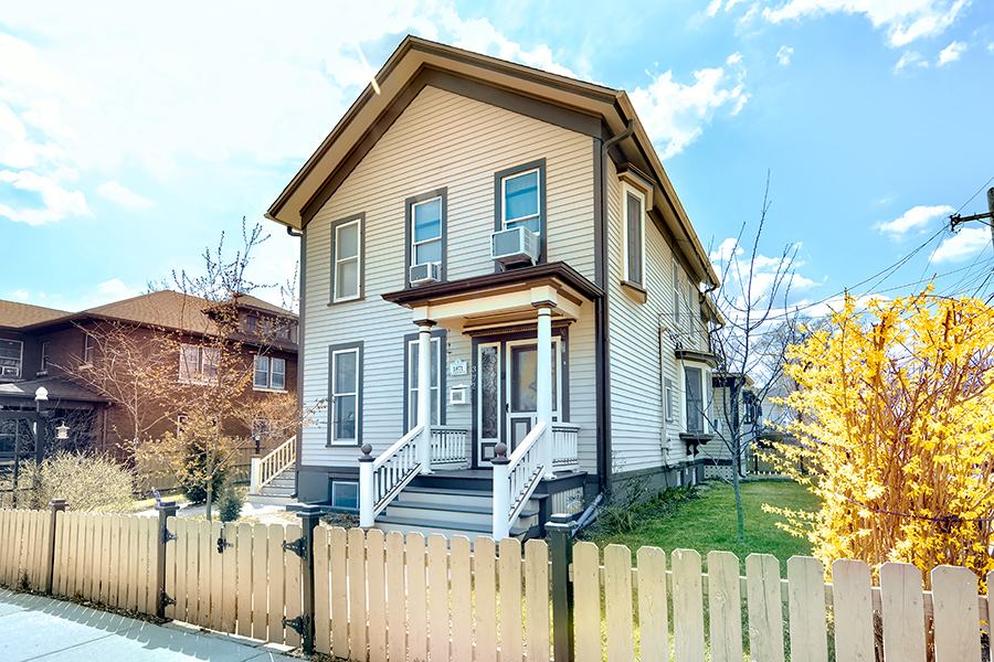 372 North Spring Street Elgin, IL 60120 - Photo 1 of 28 a front view of house with wooden fence