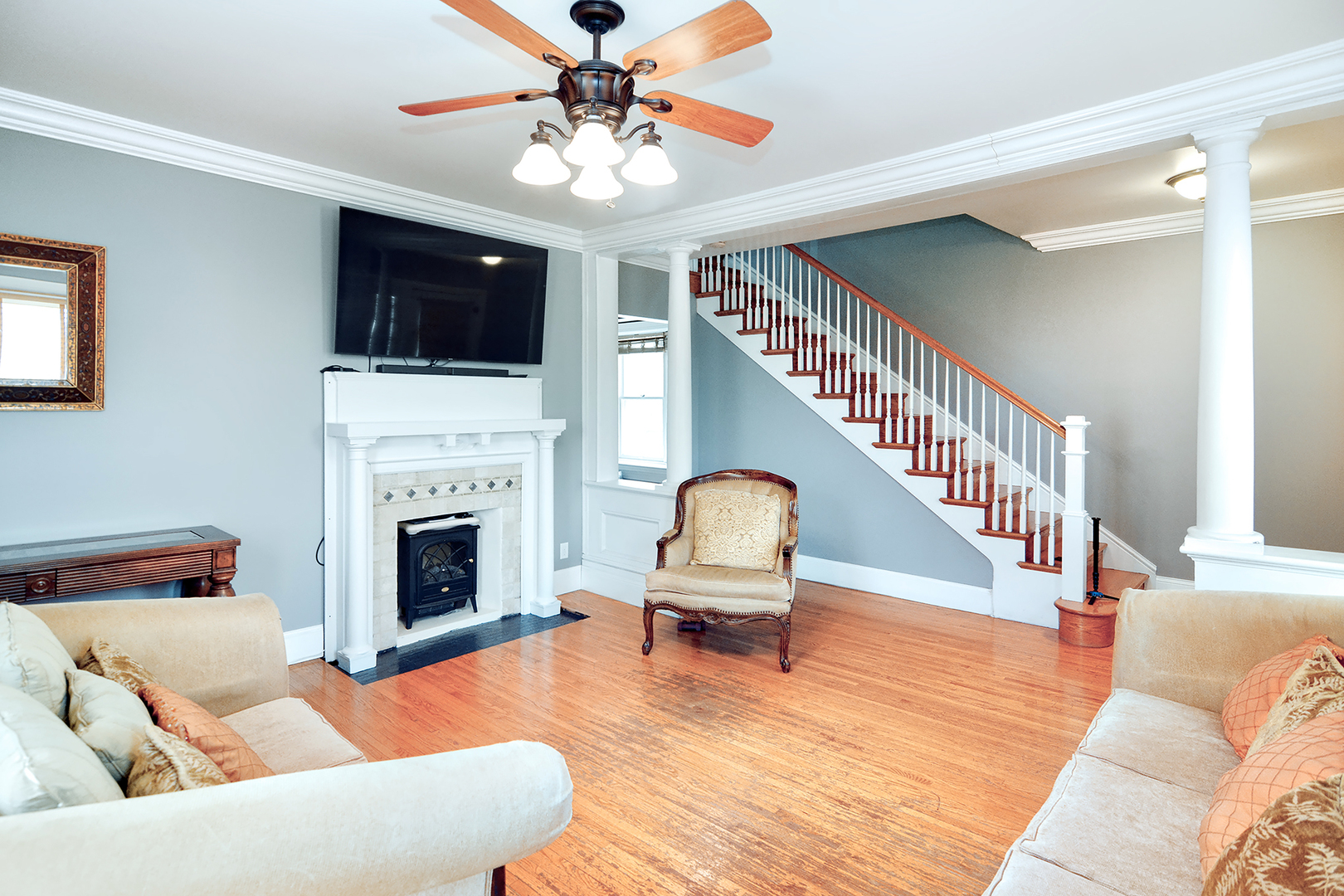 372 North Spring Street Elgin, IL 60120 - Photo 5 of 28 a living room with furniture fireplace and flat screen tv