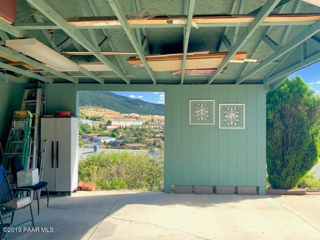 2254 Hillside Loop Road Prescott, AZ 86301 - Photo 3 of 42 Inside 2 Car Carport looking towards hom