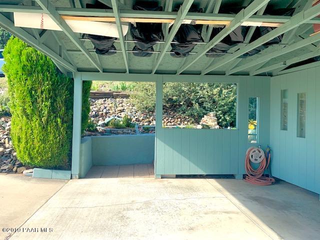 2254 Hillside Loop Road Prescott, AZ 86301 - Photo 4 of 42 Inside 2 Car Carport looking towards Mai
