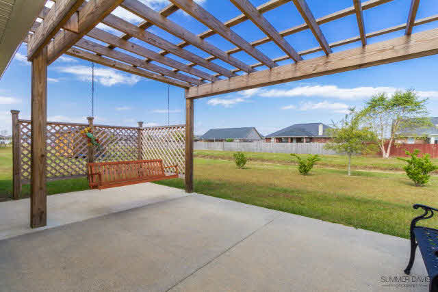 579 Fulton Loop Foley, AL 36535 - Photo 4 of 19 Pergola & swing