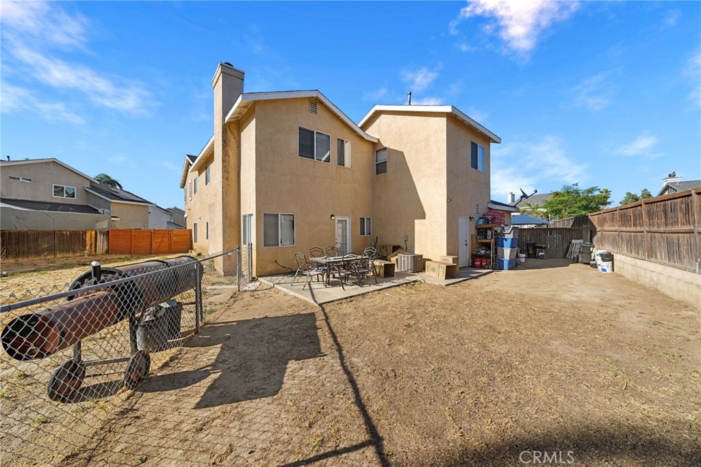 1494 Rabbit Peak Way Hemet, CA 92545 - Photo 36 of 45 a view of a house with a patio