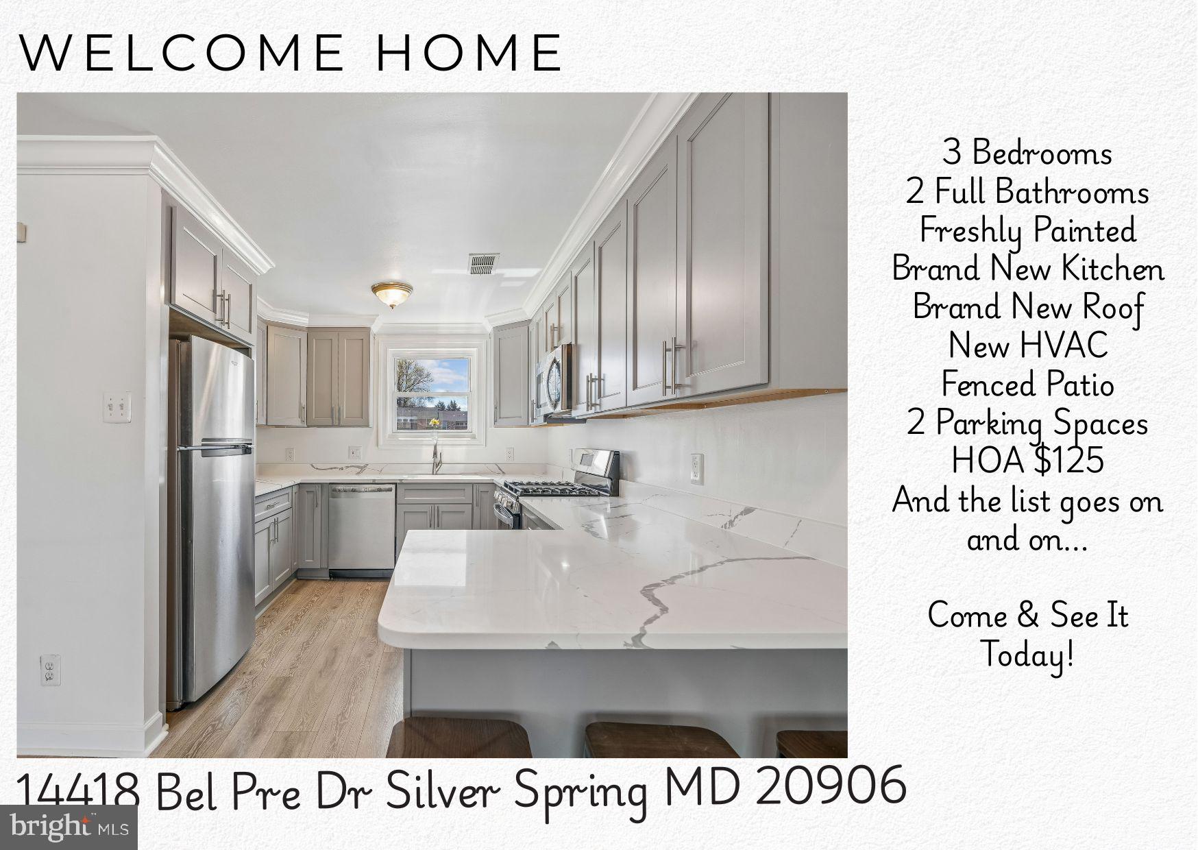 14418 Bel Pre Drive Silver Spring, MD 20906 - Photo 1 of 14 a view of a kitchen with kitchen island a sink and wooden floor