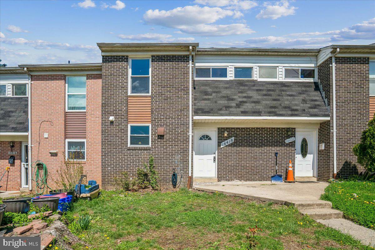 14418 Bel Pre Drive Silver Spring, MD 20906 - Photo 2 of 14 front view of a house with a yard