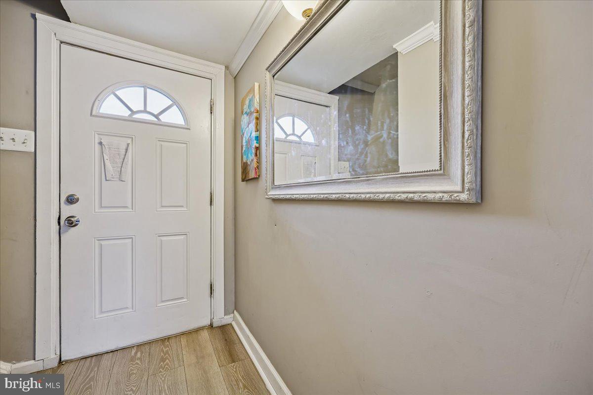 14418 Bel Pre Drive Silver Spring, MD 20906 - Photo 4 of 14 a view of front door with a door