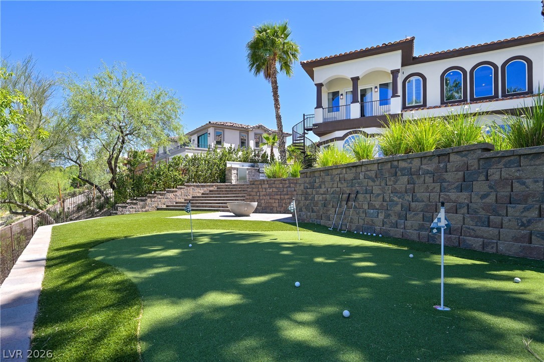 6 Rue Du Ville Henderson, NV 89011 - Photo 82 of 99 Enjoy outdoor living with a private putting green and captivating architectural details.