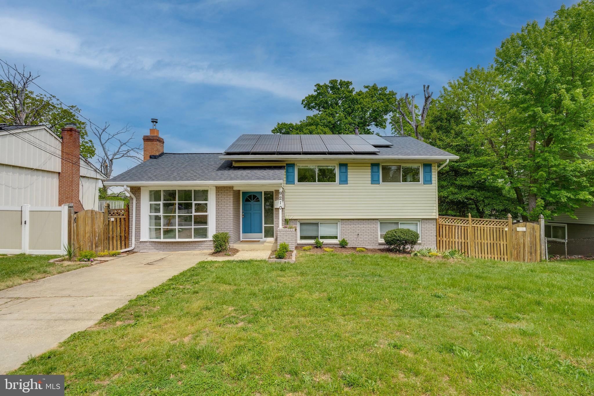 9210 Morley Road Lanham, MD 20706 - Photo 1 of 62 a front view of a house with a yard