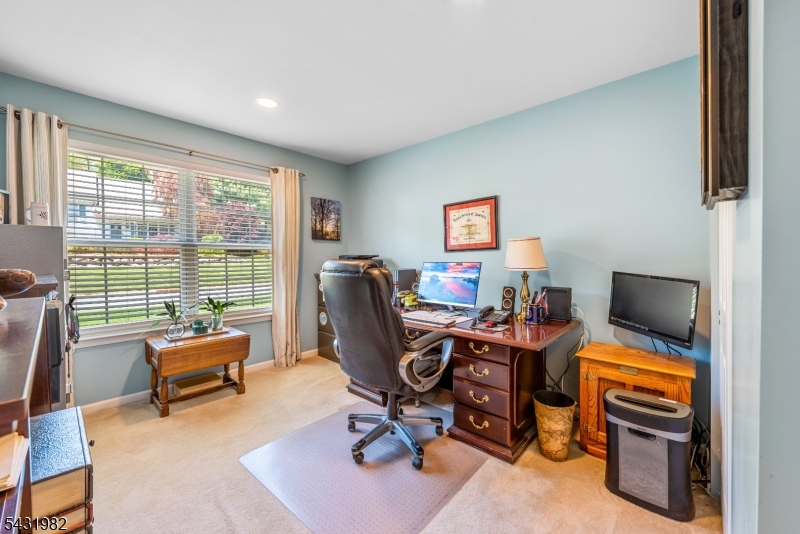 21 Towpath Lane Stanhope, NJ 07874 - Photo 15 of 37 a view of a workspace with furniture and a window