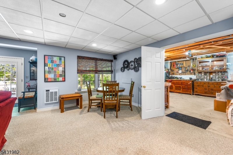 21 Towpath Lane Stanhope, NJ 07874 - Photo 26 of 37 a view of a livingroom with furniture wooden floor and a window