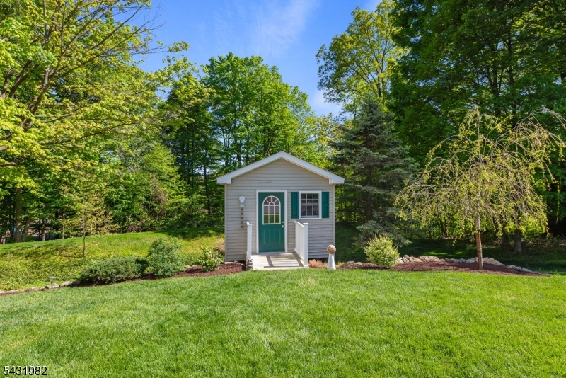 21 Towpath Lane Stanhope, NJ 07874 - Photo 30 of 37 a view of a house with backyard and garden