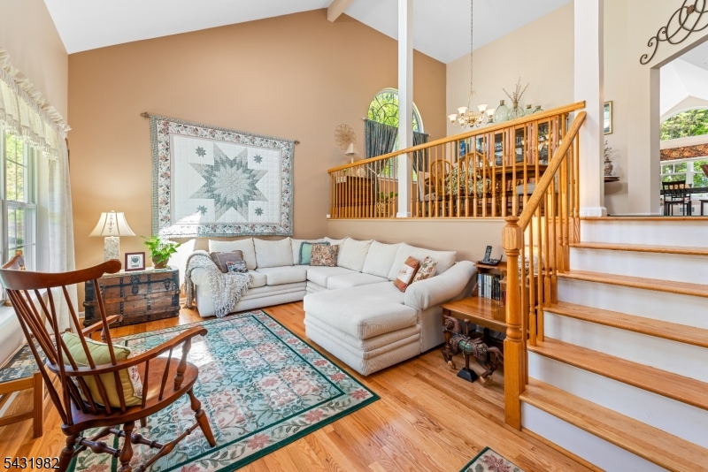 21 Towpath Lane Stanhope, NJ 07874 - Photo 3 of 37 a living room with fireplace furniture and a rug