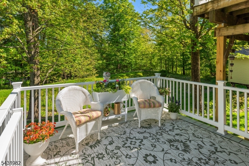 21 Towpath Lane Stanhope, NJ 07874 - Photo 32 of 37 a view of a chairs and table in the balcony