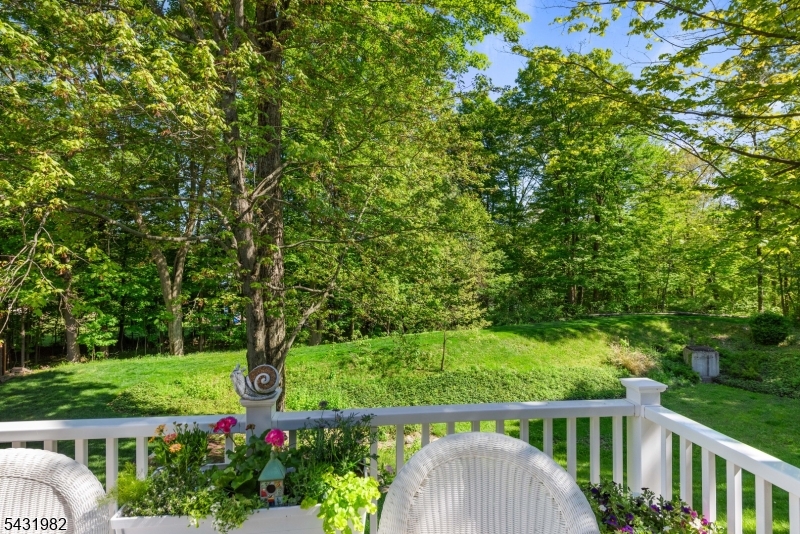 21 Towpath Lane Stanhope, NJ 07874 - Photo 33 of 37 a view of a yard with a tree