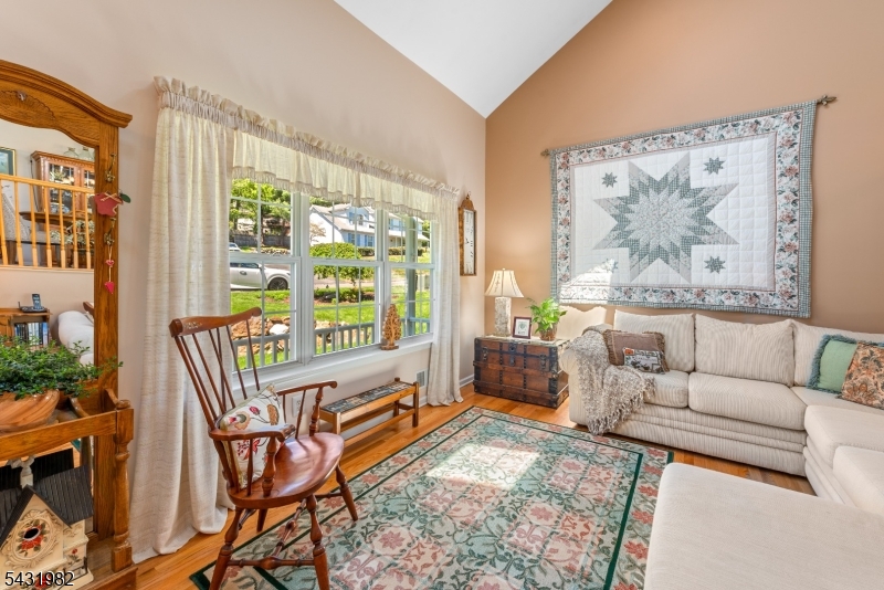 21 Towpath Lane Stanhope, NJ 07874 - Photo 4 of 37 a living room with furniture and a large window