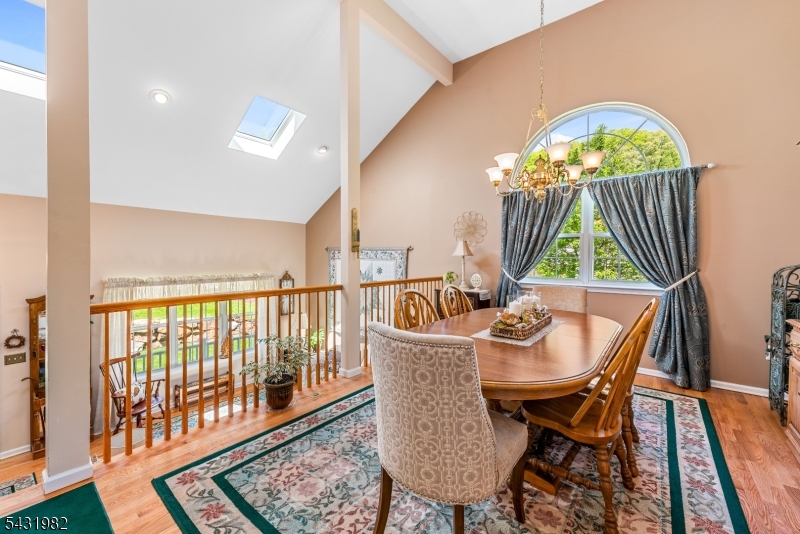 21 Towpath Lane Stanhope, NJ 07874 - Photo 6 of 37 a view of a dining room with furniture window and wooden floor
