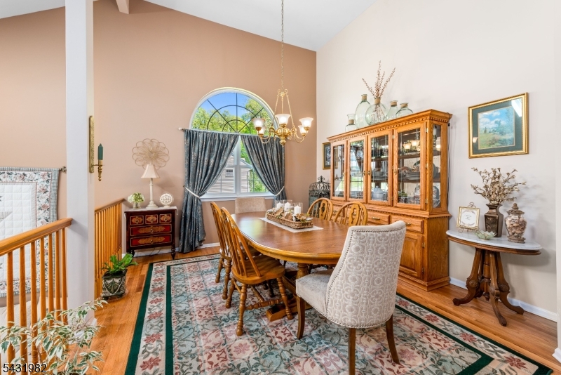 21 Towpath Lane Stanhope, NJ 07874 - Photo 7 of 37 a view of a dining room with furniture and wooden floor