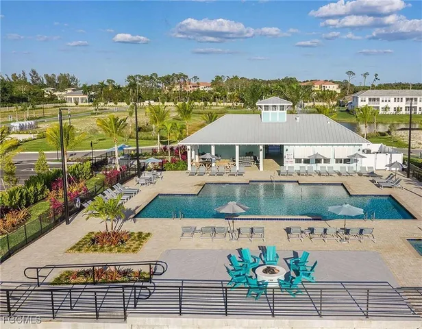 an aerial view of a house with a ocean view
