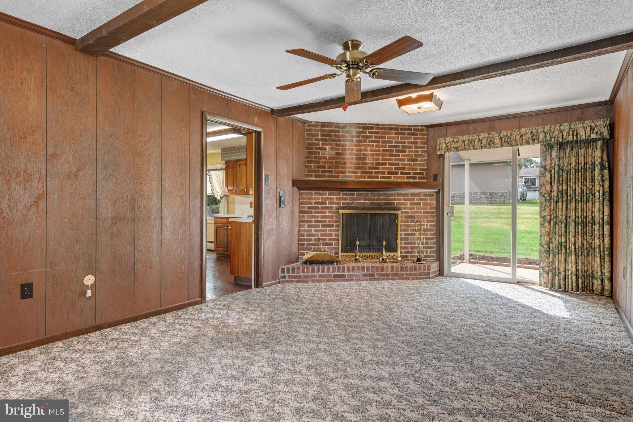 1818 Roxboro Road York, PA 17402 - Photo 15 of 39 a view of a livingroom with a fireplace and cabinet