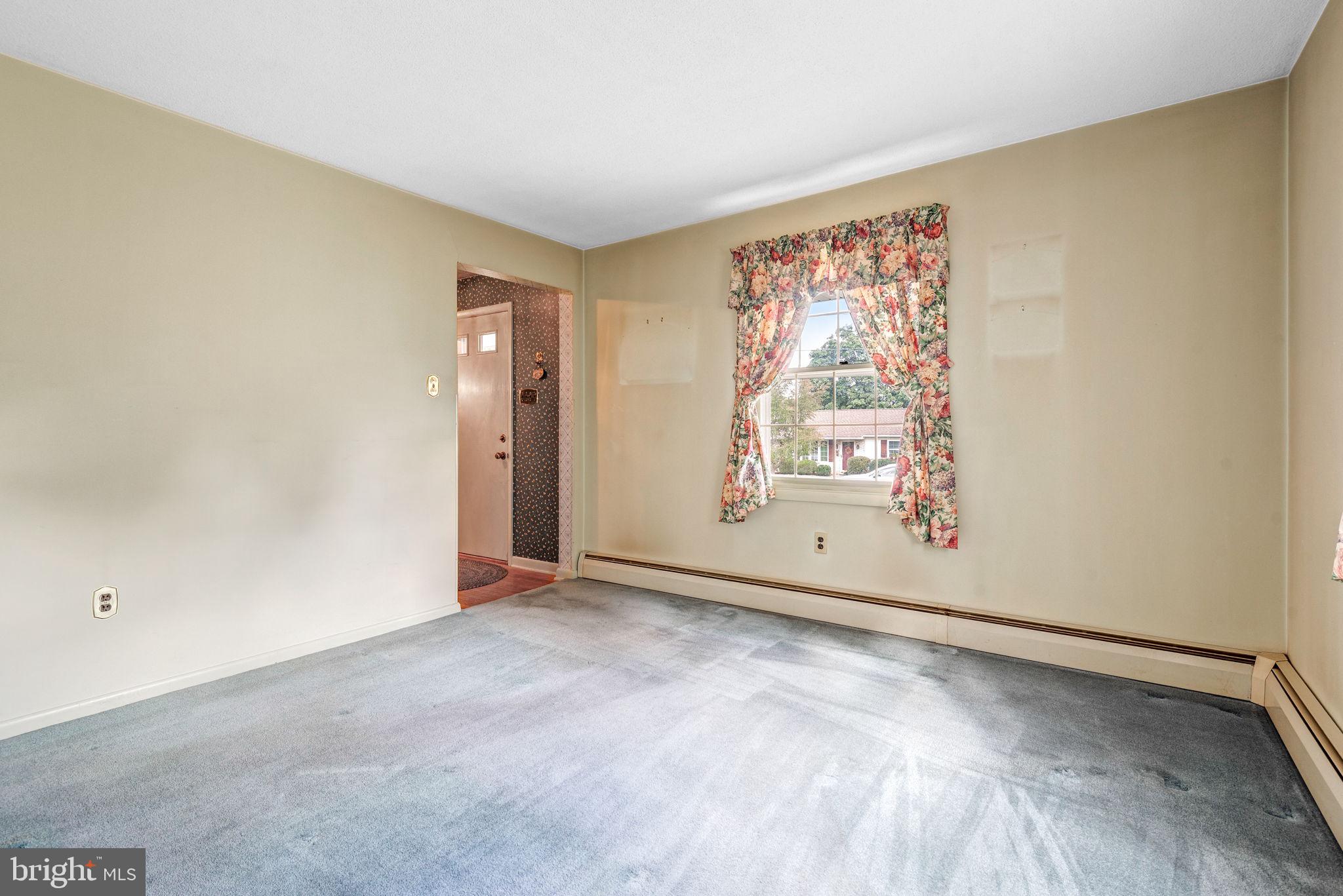 1818 Roxboro Road York, PA 17402 - Photo 20 of 39 an empty room with windows
