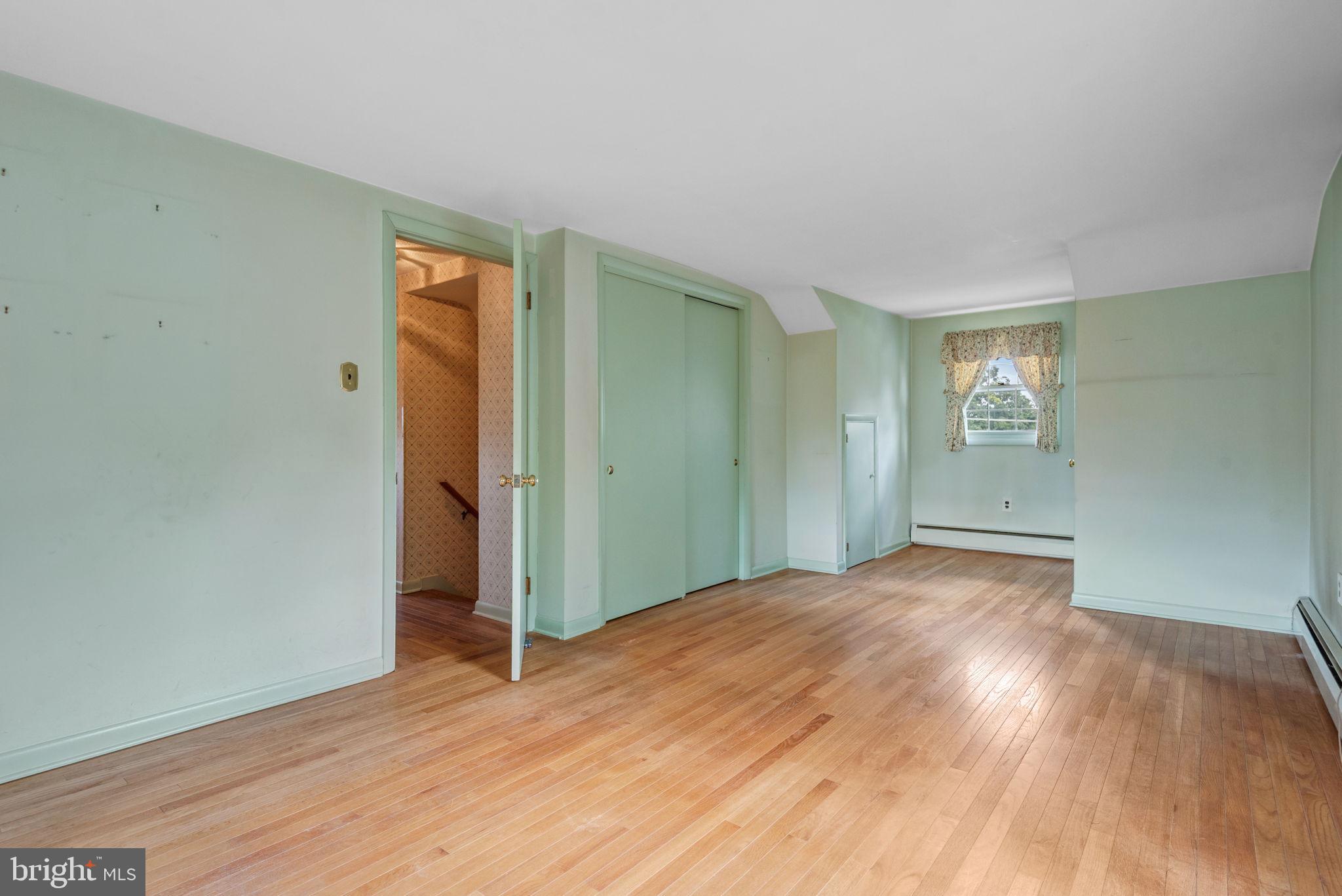 1818 Roxboro Road York, PA 17402 - Photo 25 of 39 a view of empty room with wooden floor and fan