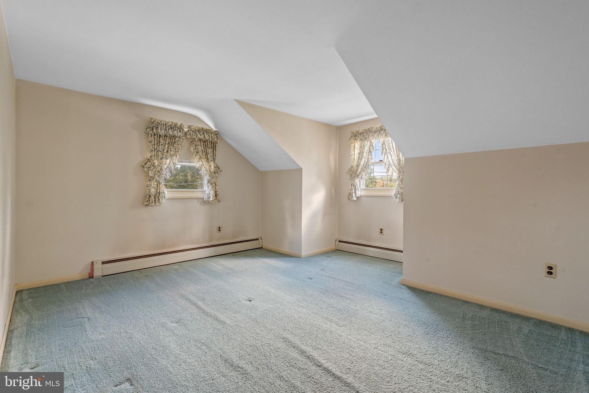 1818 Roxboro Road York, PA 17402 - Photo 26 of 39 an empty room with windows