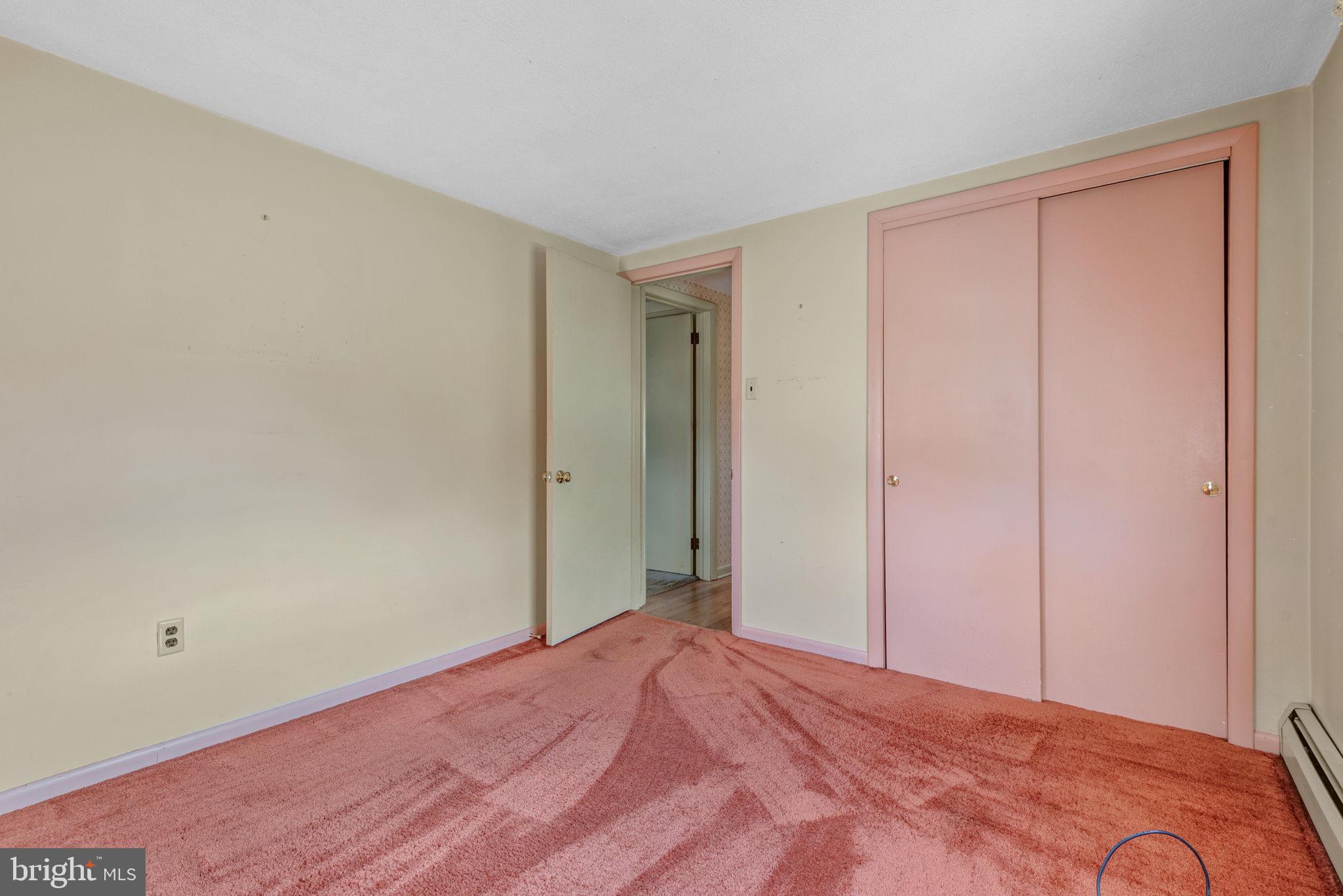 1818 Roxboro Road York, PA 17402 - Photo 29 of 39 a bedroom with a bed and a closet