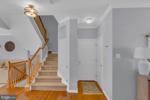 a view of a storage & utility room with two washing machine