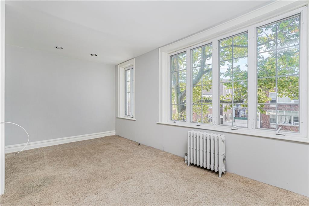 106 Village Road South Brooklyn, NY 11223 - Photo 22 of 42 a view of a room with a large window