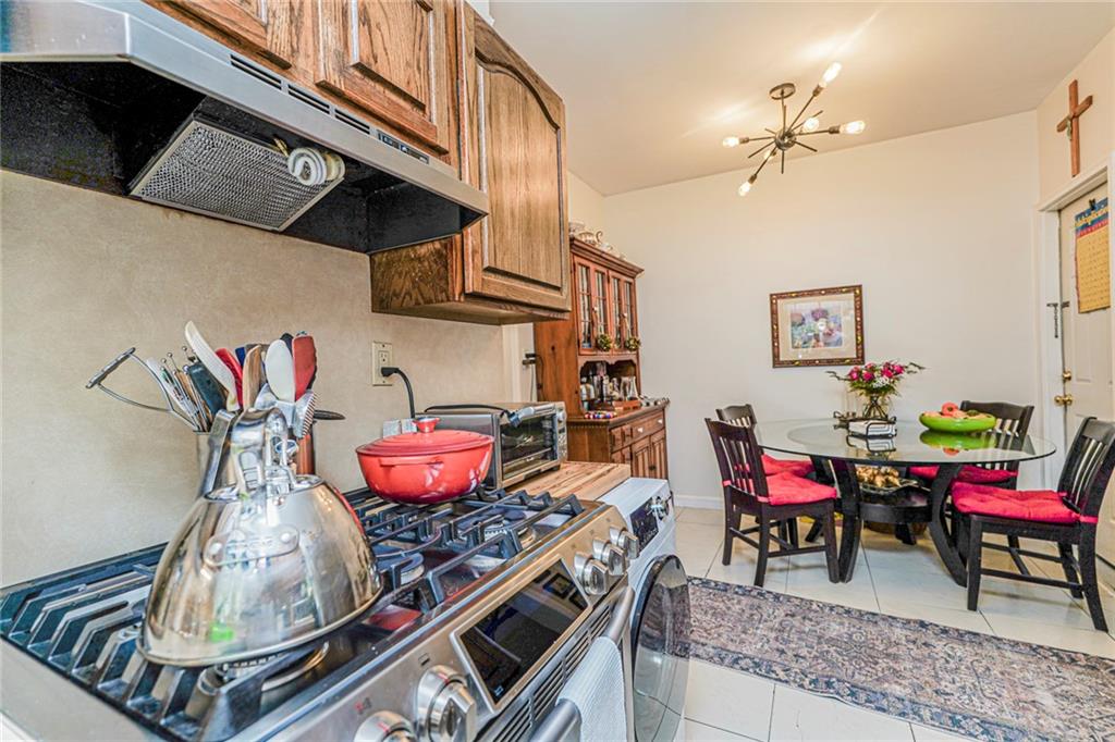 106 Village Road South Brooklyn, NY 11223 - Photo 32 of 42 a dining room with furniture
