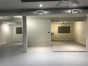 an empty room with windows