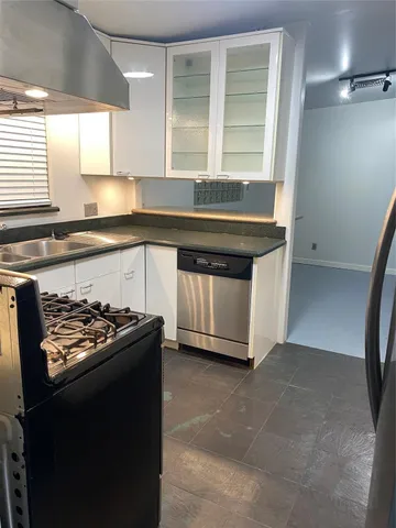 a room with furniture and a fireplace