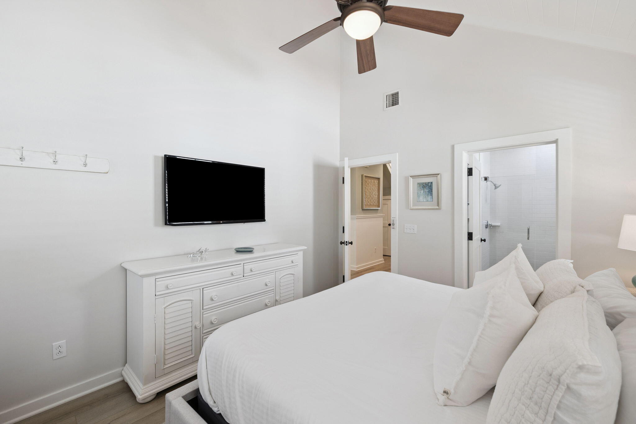 261 Salt Lane Inlet Beach, FL 32461 - Photo 13 of 36 a bedroom with a bed and a flat screen tv