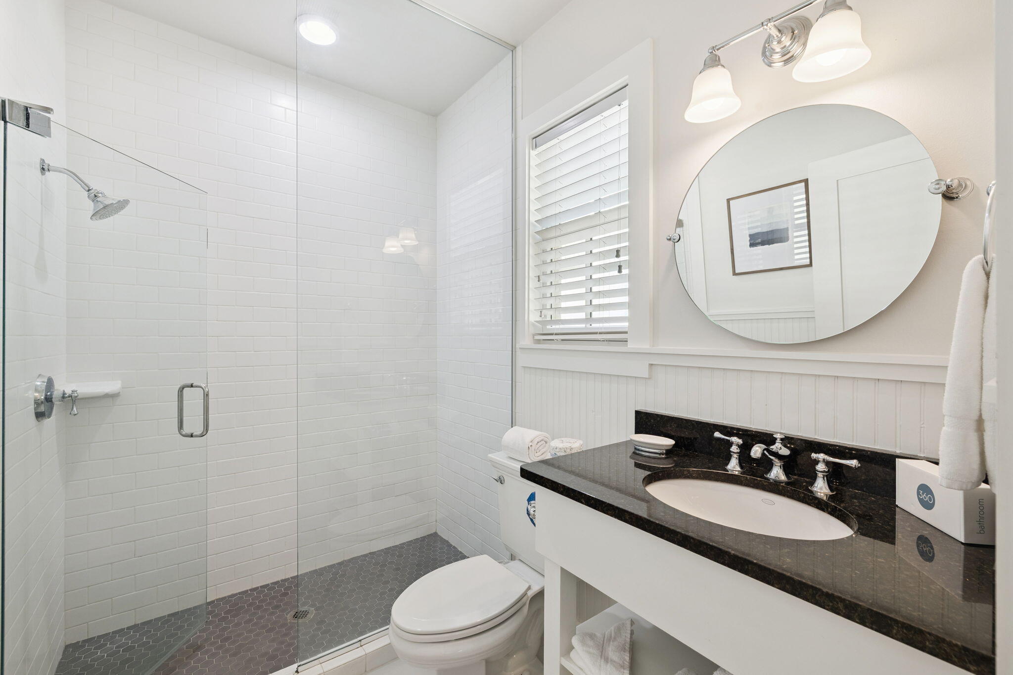 261 Salt Lane Inlet Beach, FL 32461 - Photo 14 of 36 a bathroom with a sink vanity mirror and toilet