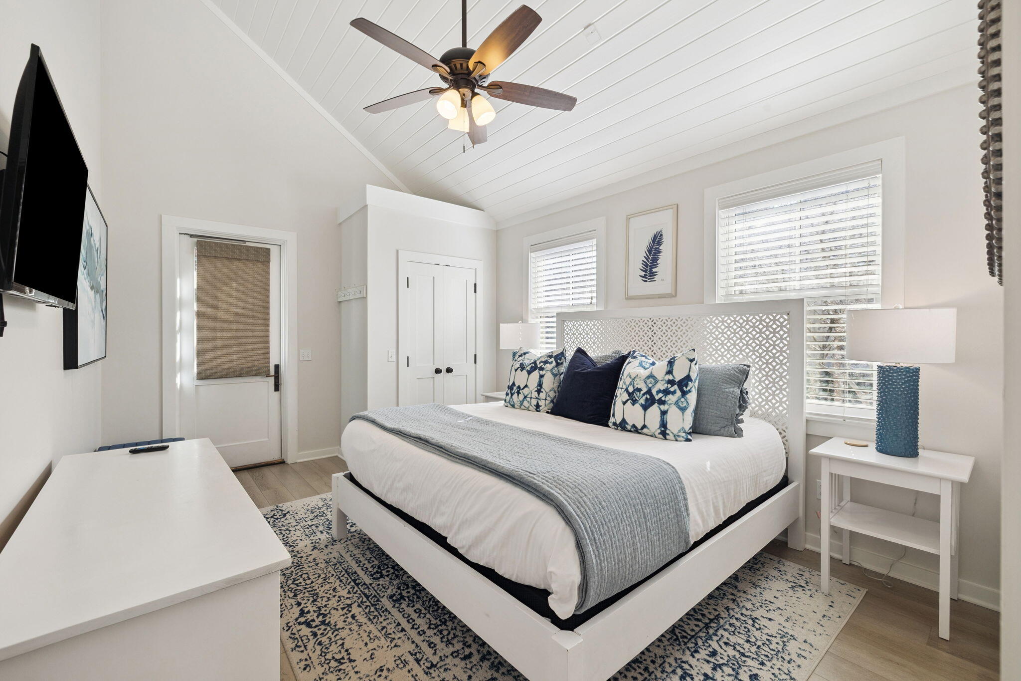 261 Salt Lane Inlet Beach, FL 32461 - Photo 15 of 36 a bedroom with a bed and a flat screen tv