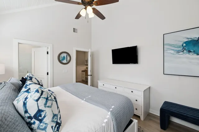 a bathroom with a sink and mirror with toilet
