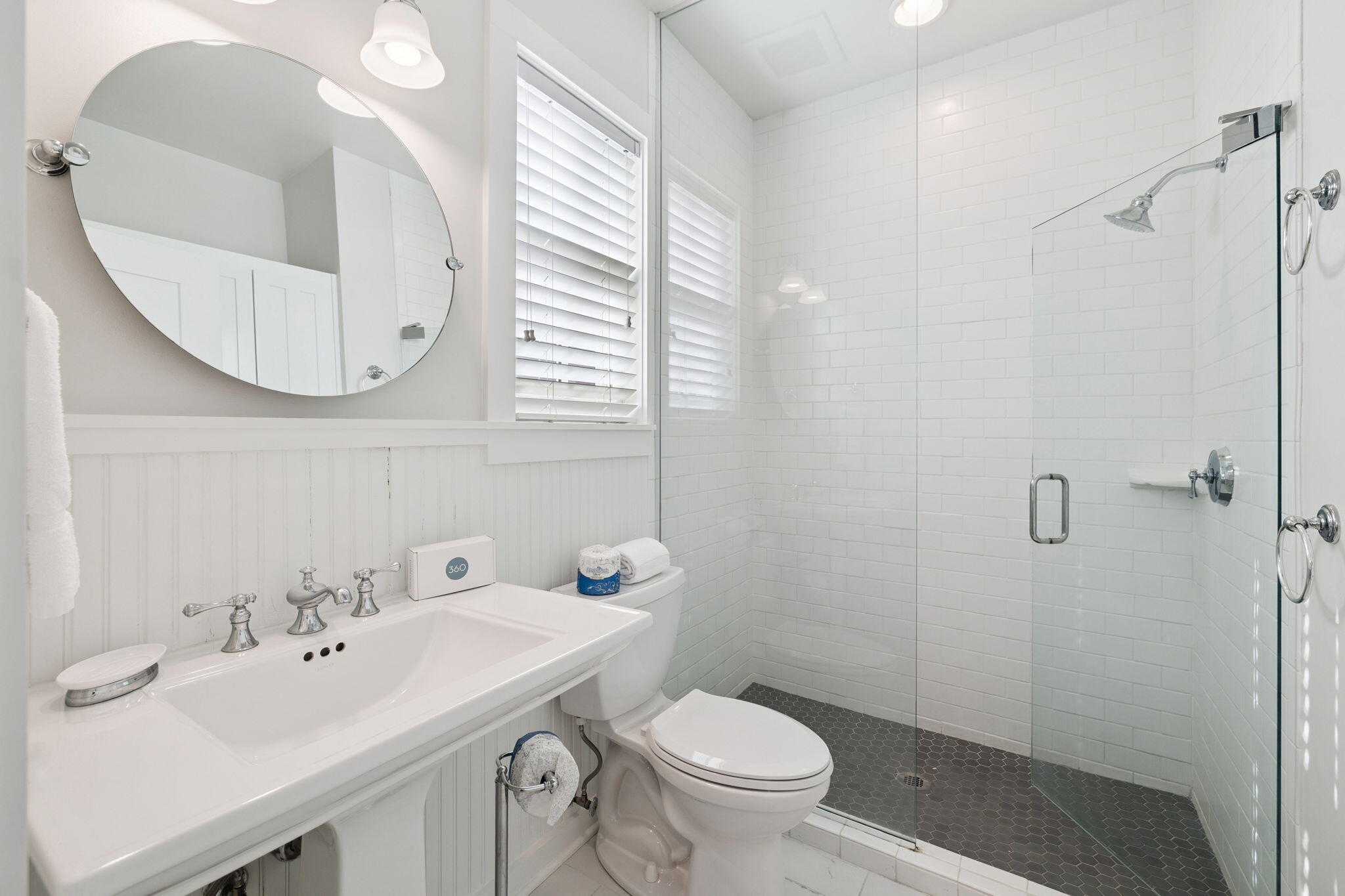 261 Salt Lane Inlet Beach, FL 32461 - Photo 17 of 36 a bathroom with a sink and mirror with toilet