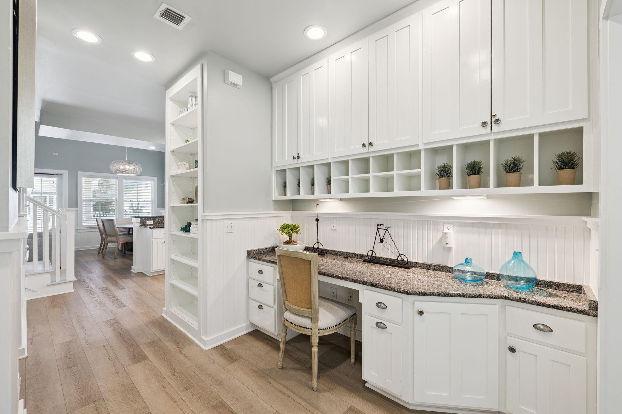 261 Salt Lane Inlet Beach, FL 32461 - Photo 18 of 36 a kitchen with granite countertop white cabinets and stainless steel appliances