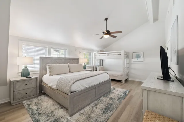 a kitchen with a sink cabinets and a window