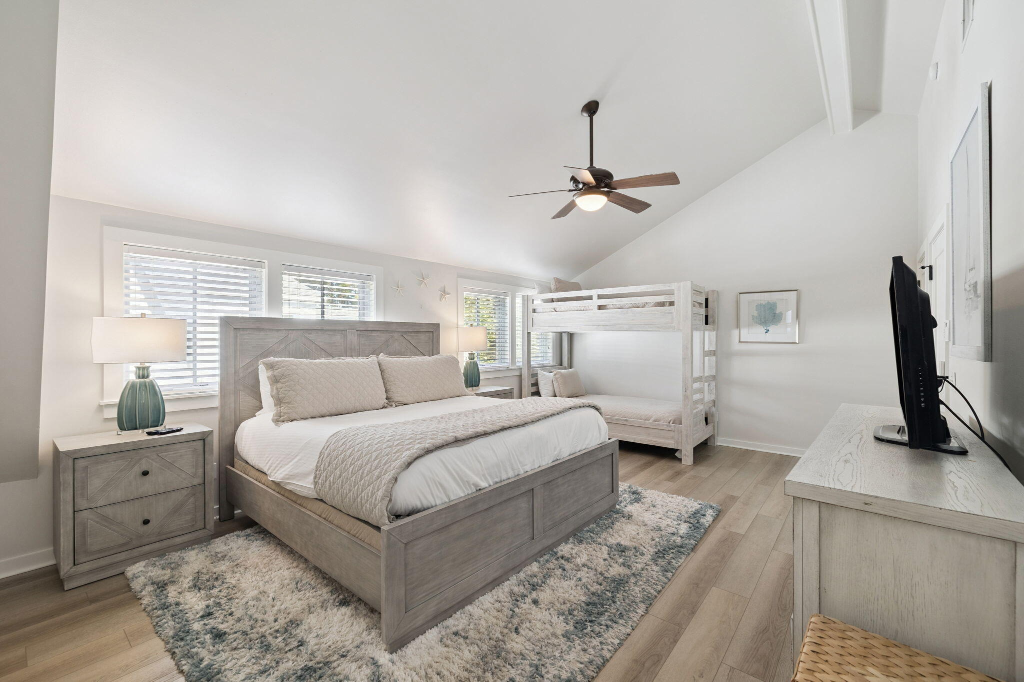 261 Salt Lane Inlet Beach, FL 32461 - Photo 23 of 36 a bedroom with a bed and a flat screen tv