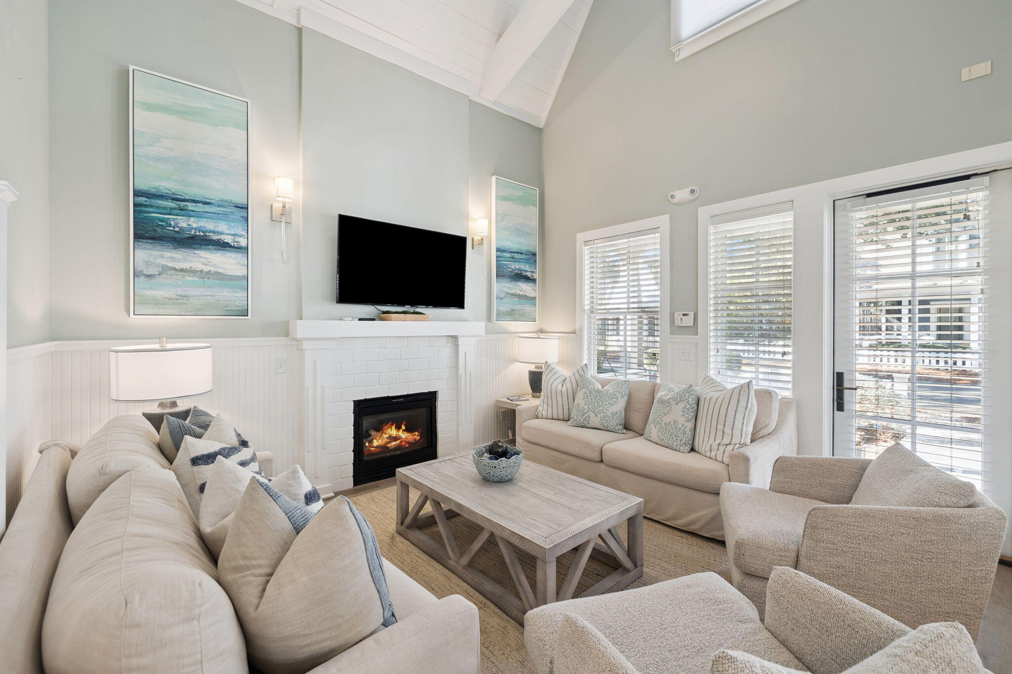 261 Salt Lane Inlet Beach, FL 32461 - Photo 6 of 36 a living room with furniture a fireplace and a flat screen tv