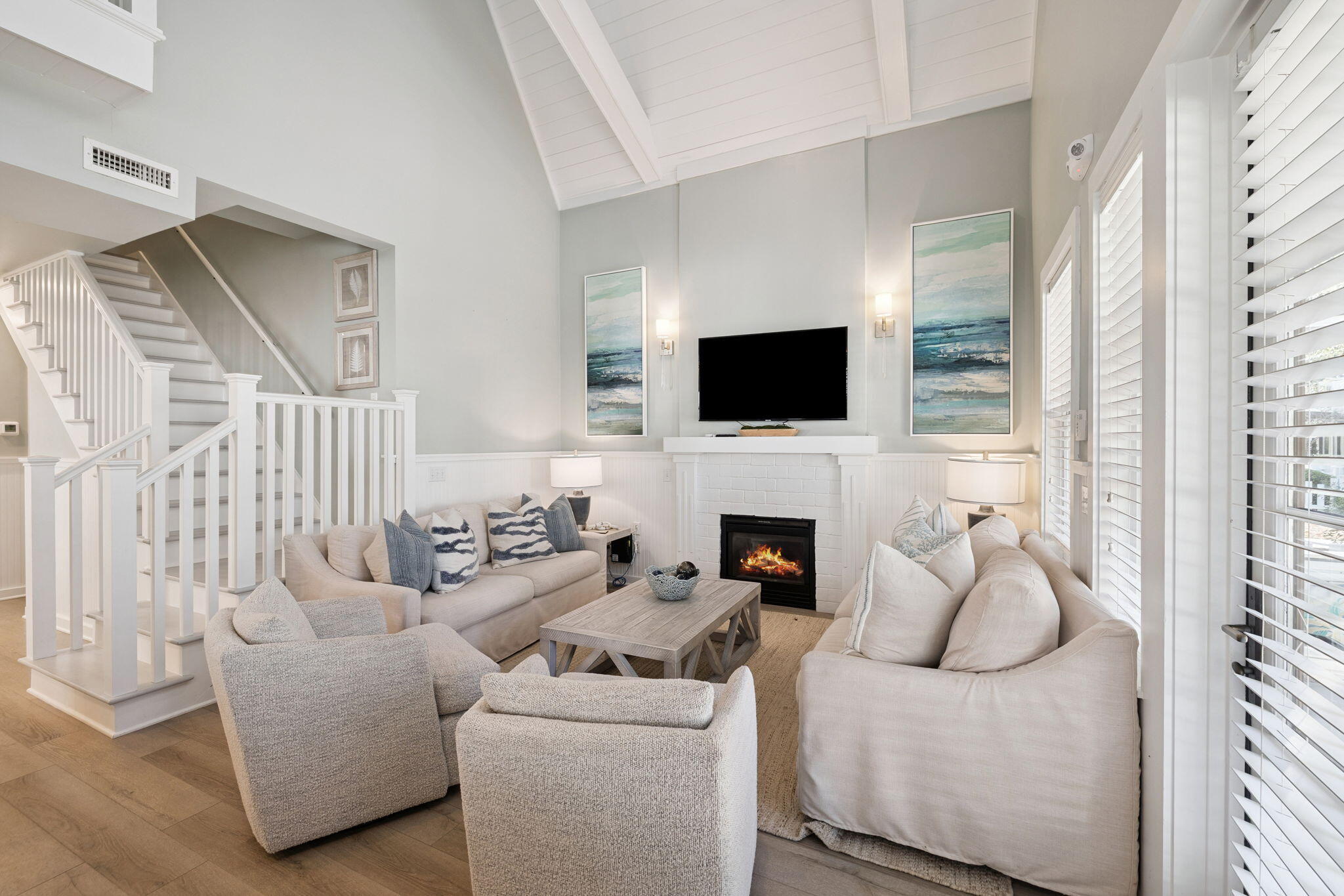 261 Salt Lane Inlet Beach, FL 32461 - Photo 7 of 36 a living room with furniture a fireplace and a flat screen tv