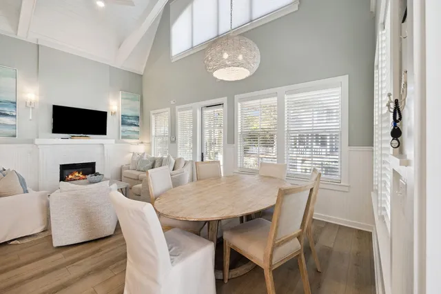 a kitchen with a stove a sink a refrigerator and cabinets