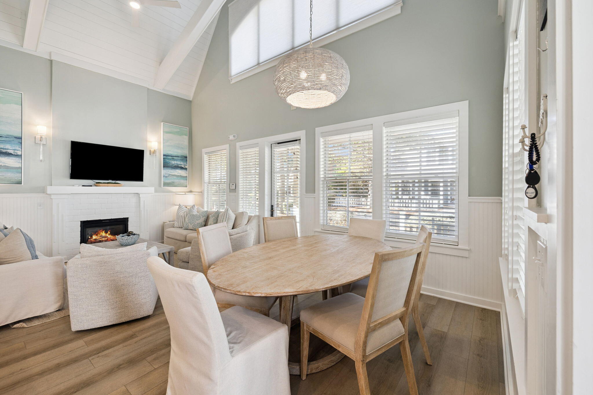 261 Salt Lane Inlet Beach, FL 32461 - Photo 9 of 36 a view of a dining room with furniture window and wooden floor