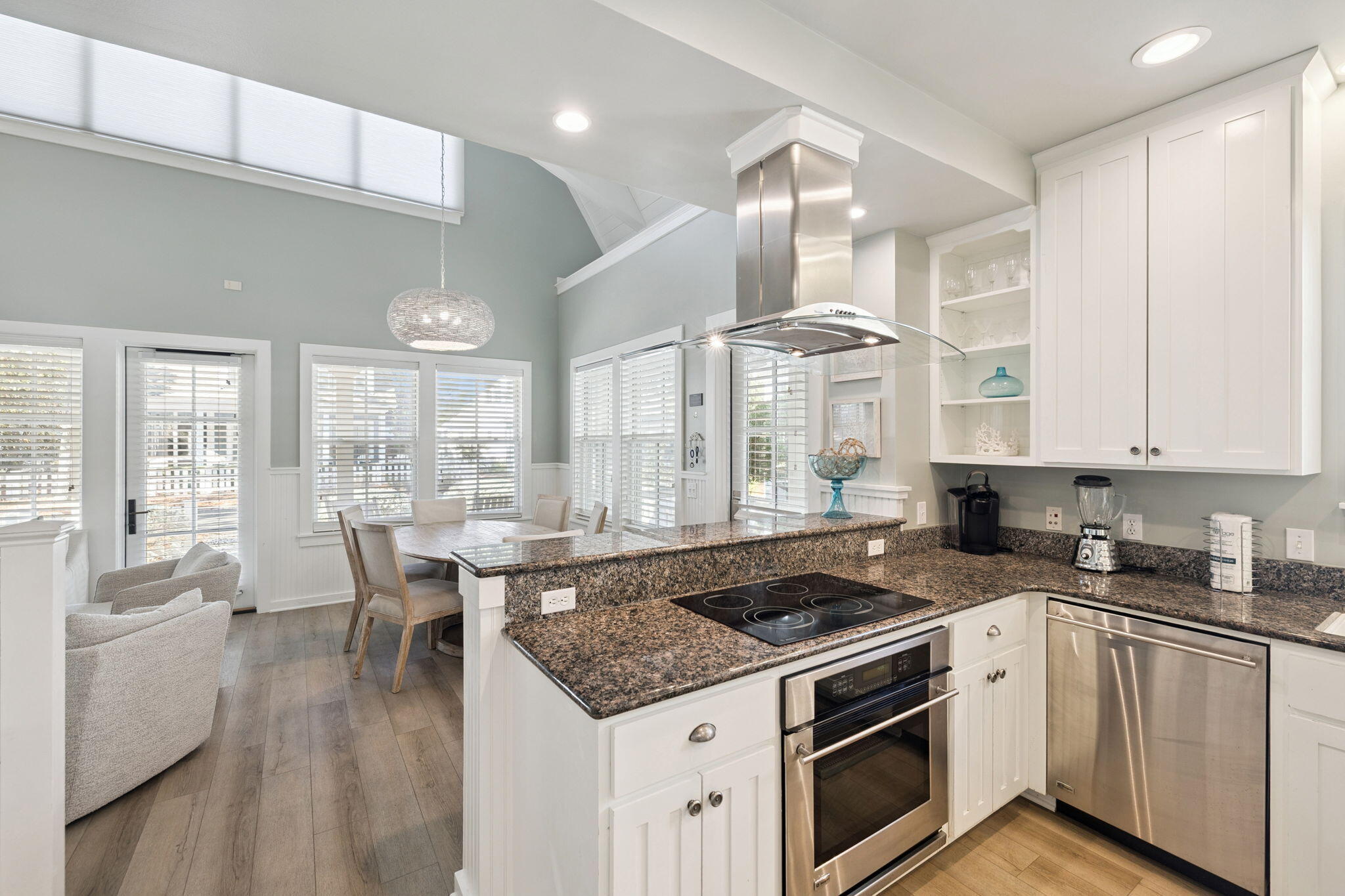261 Salt Lane Inlet Beach, FL 32461 - Photo 10 of 36 a kitchen with a stove a sink a refrigerator and cabinets