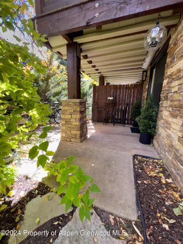 a view of a building with sitting area