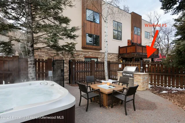 a street view with tall buildings