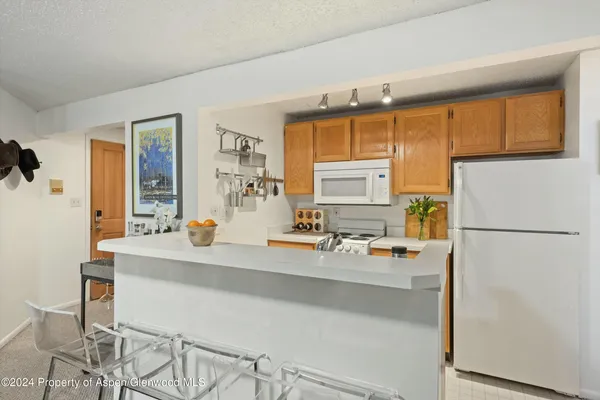 a view of living room with furniture and flat screen tv